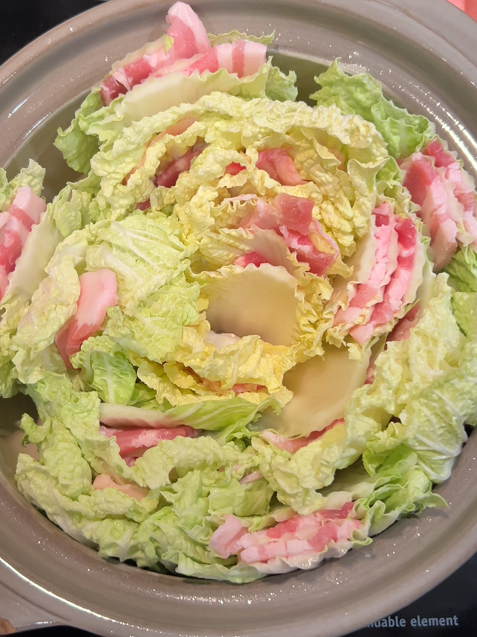 layers of napa cabbage and pork