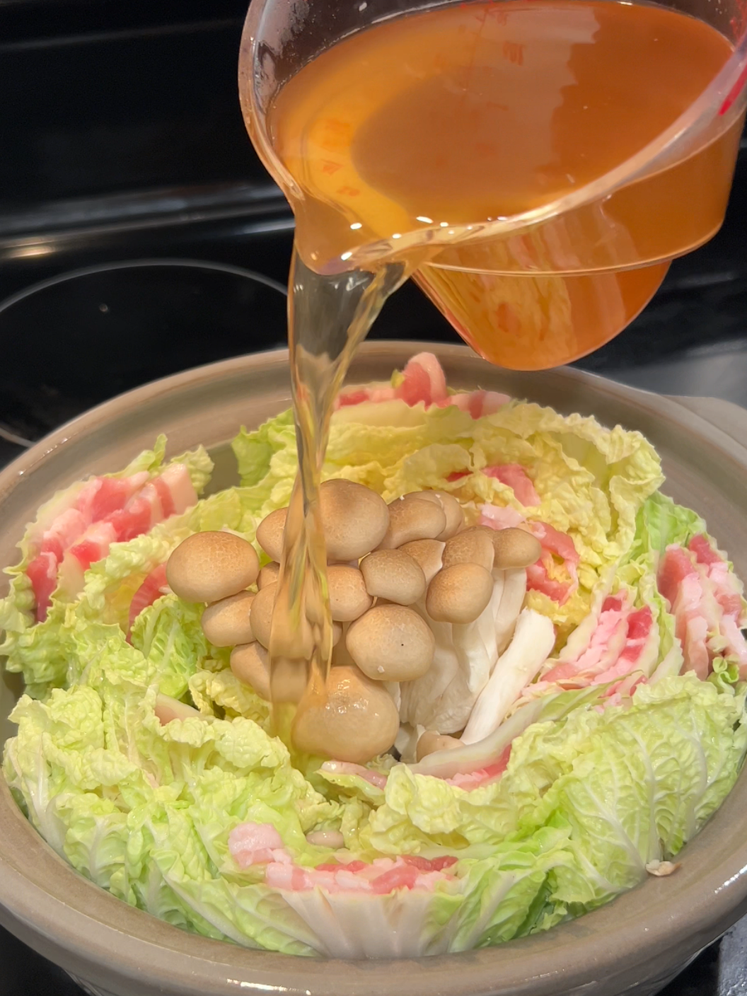 pouring dashi broth