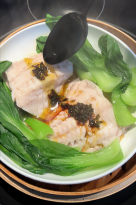 Steamed snapper with sizzled scallion oil