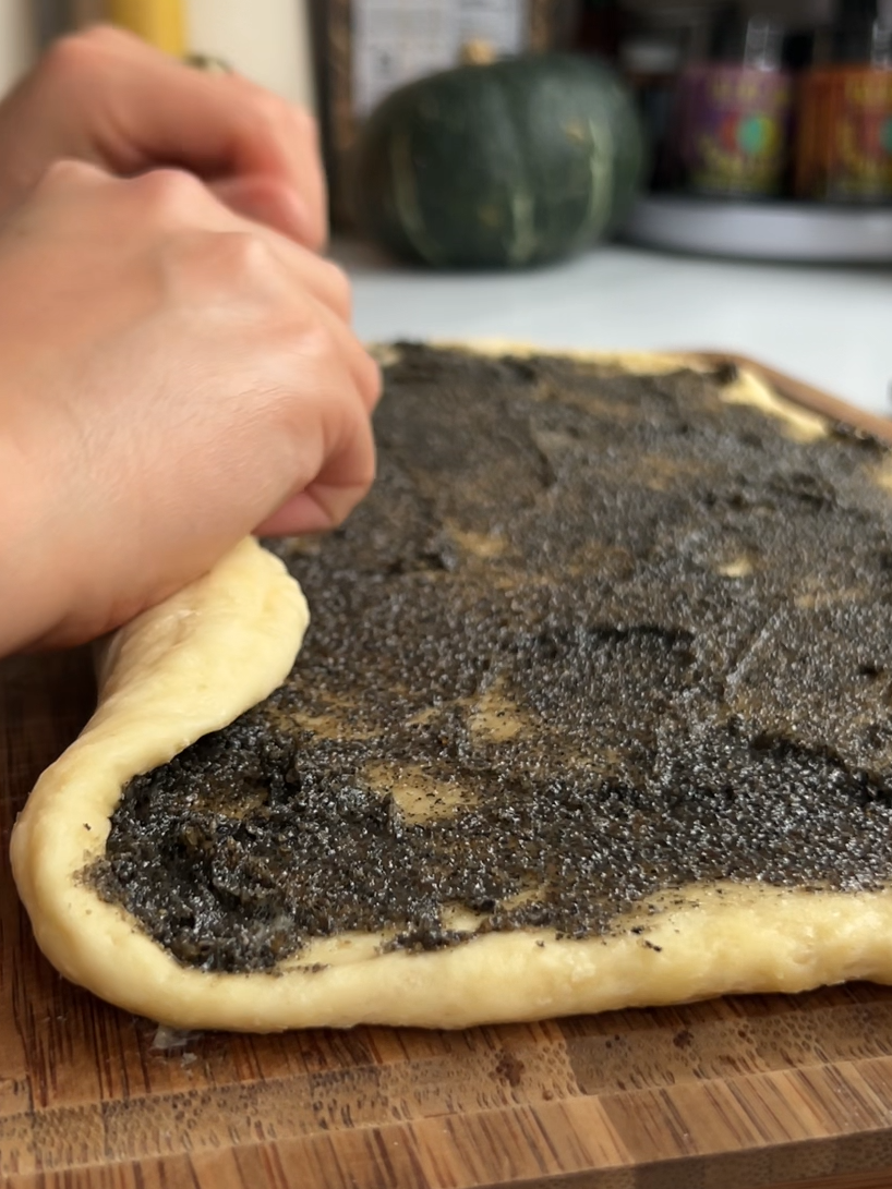 rolling black sesame buns