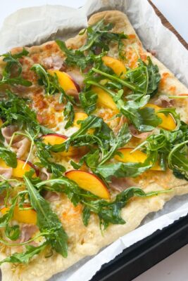 nectarine and prosciutto flatbread with yuzu-y arugula